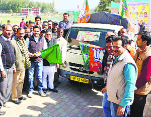 MP Anurag Thakur and BJP president Satpal Satti flag off a truck carrying steel, mud and water to Gujarat for Sardar Patels statue at Una on Thursday.