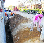The dug-up foundation of the building where a man fell and died at New Raj Nagar in Jalandhar on Thursday. Tribune photo: Malkiat Singh