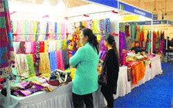 Visitors take a round of Pakistani stalls during Indo-Pak trade fair at Desh Bhagat Yadgaar Hall in Jalandhar on Thursday. Tribune photo: Malkiat Singh