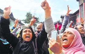 Safai karamcharis stage a demonstration in protest against the state government over their long-pending demands in Srinagar on Thursday.