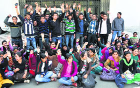 Students and scholars protest against the alleged favouritism and dictatorial policies of the Jammu University authorities on the campus on Thursday.