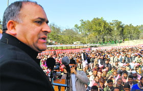 Former Minister of State for Health Shabir Ahmad Khan addresses a public rally in Rajouri on Thursday.
