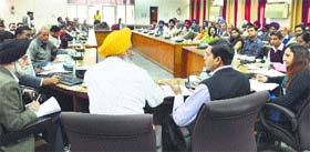 Deputy Commissioner-cum-District Election Officer Rajat Aggarwal (second from right) at a meeting with representatives of political parties at Bachat Bhawan in Ludhiana
