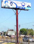 A Youth Akali Dal hoarding on the Fazilka-Delhi highway in Malout on Thursday. Tribune photo 