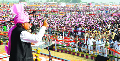 Chief Minister Bhupinder Singh Hooda addresses a gathering during the Haryana Shakti Rally held at Gohana