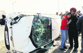Mangled remains of the car that met with an accident in Amritsar on Friday. Two persons were killed in the mishap.