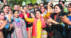 Congress workers celebrated outside sitting MP Pawan Kumar Bansals residence in Sector 28, Chandigarh, after getting news that his name had been cleared for the Chandigarh Lok Sabha seat on Friday.