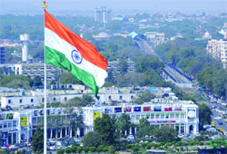Indian flag flies on the 207-ft flagpole at Central Park in Connaught Place on Friday. tribune Photo: Mukesh