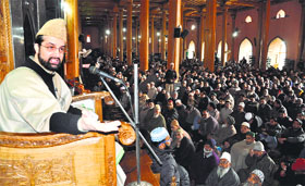 Mirwaiz Umar Farooq, chairman of the moderate faction of the Hurriyat Conference, addresses people at the Jamia Masjid in Srinagar on Friday.