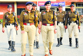 Under-training IPS officer Amneet Kondal (L) and probationary PPS officer Dr Richa Agnihotri with constables of the WASPS at the Police Commissioners office in Jalandhar.