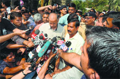 AAP leader Arvind Kejriwal speaks to the media on the outskirts of Ahmedabad on Friday.  AFP