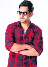 Babbal Rais tinted glasses give him a dapper look