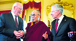 US Senate Majority Leader Harry Reid (right) and Patrick Leahy with the Dalai Lama on Capitol Hill in Washington on Friday