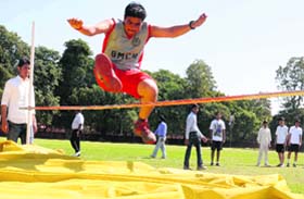 A player takes part in the high jump event during the 21st annual athletics meet of GMCH, Sector 32, at Sports Complex in Sector 46, Chandigarh, on Saturday