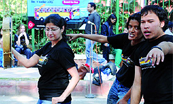 Activists of a global human rights organisation perform a street play as a part of Board the Bus campaign to activate women to reclaim thier space in the public transports, on the occasion of the International Womens Day at Jantar Mantar in New Delhi on Saturday