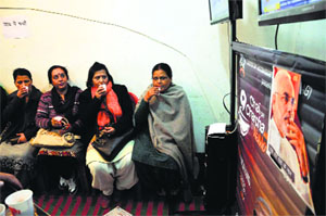 BJP supporters connect at a Chai pe Charcha in Shimla on Saturday.