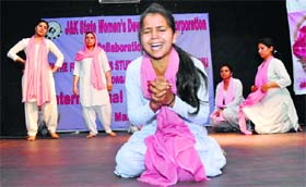 Girls present a skit during at a function organised by the J&K State Womens Development Corporation at Jammu