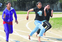 Participants during a 100-m race at the annual athletics meet of BCM College of Education in Ludhiana. Photo: Inderjeet Verma
