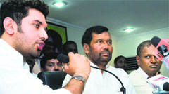 Chirag Paswan, son of LJP chief Ram Vilas Paswan (left), addresses a press conference in New Delhi. Tribune photo