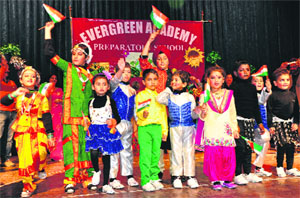 Students of Evergreen Academy Preparatory School present an item during their annual function at the Law Bhawan auditorium in Chandigarh on Sunday. 
