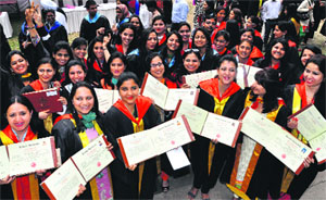 Students in a jubilant mood after receiving their PhD degrees during the 63rd annual convocation of Panjab University in Chandigarh on Sunday.