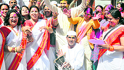 BJP leader Prakash Pant celebrates Holi with Kumaoni folk artistes at his residence in Dehradun on Sunday