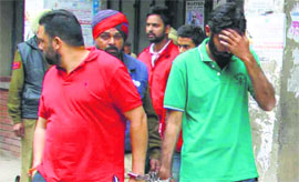 The accused being taken to the court in Ludhiana on Sunday.