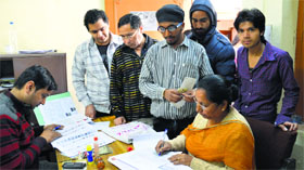 A Booth-Level Officers make corrections in voter lists at the Government School, Chawani Mohalla, during a special camp.