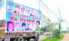 A hoarding with pictures of BSP leaders on Nakodar road in Jalandhar.
