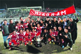 The Mizoram team with the Santosh Trophy after beating Railways in the final on Sunday