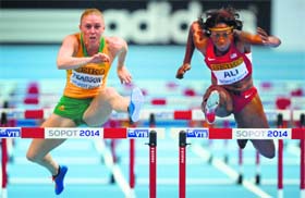 Nia Ali (right) of USA pipped Australian defending champion Sally Pearson to win the 60m hurdles title at the world indoor athletics championships in Sopot on Saturday