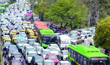 A heavy traffic jam at Vikas Marg in New Delhi on Monday.