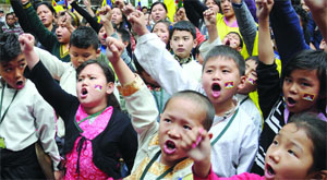 Exiled Tibetan activists shout slogans during a protest on the occasion of the 55th Tibetan Uprising Day at Jantar Mantar in New Delhi on Monday.
