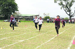 Students participate in a race during the fraternity week celebrations at SGRRITS in Dehradun on Monday.