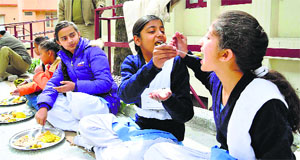Children take part in priti bhoj during a Nirankari Bal Sewa Dal training camp in Shimla on Sunday.