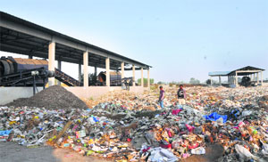 A view of garbage dumped outside the non-functional solid waste management plant at Shekhpura Shuana village in Karnal