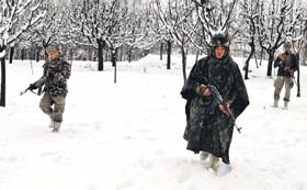 Army personnel cordon off the area in Kupwara