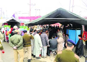 Patients at a free medical camp organised by the CRPF in Srinagar on Monday