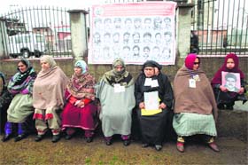 Relatives of disappeared persons stage a protest in Srinagar on Monday