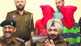 The murder accused in police custody in Jalandhar on Monday.