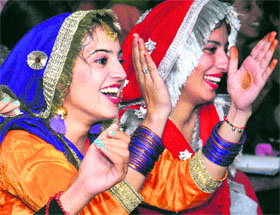 Students of the Khalsa College for Women buck up performers at a function held in their college in Jalandhar.