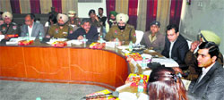 DC Rajat Aggarwal addresses a joint meeting of police and civil officers. Photo: Inderjeet Verma