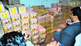 Health Department officials inspecting the cartons of juice at a school in Patiala on Monday.