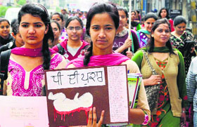 Girls take out an awareness rally against dowry and female foeticide in Patiala on Monday.