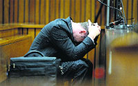 Pistorious breaks down during the trial in Pretoria on Monday. AFP