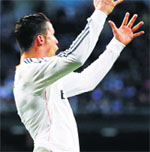 Cristiano Ronaldo celebrates after scoring a goal against Levante during their Spanish first division soccer match at Santiago Bernabeu stadium in Madrid. Reuters