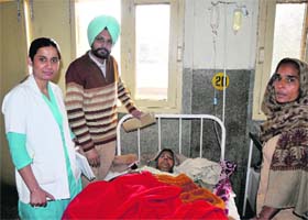 Dr Maninder with the patient Surjit Kaur who was operated upon for a cystic tumour at the Civil Hospital in Bathinda