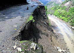 A sidewall that caved in on the Mussoorie-Kempty-Yamunotri road on Tuesday