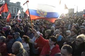 Pro-Russian demonstrators take part in a rally in the Crimean town of Yevpatoria