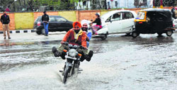 A road gets flooded after a heavy rain in Jammu. Tribune photo: Inderjeet Singh